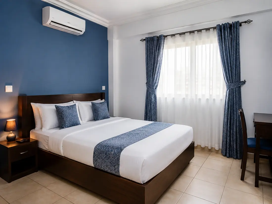Chambre climatisée à La Résidence 244 Lomé