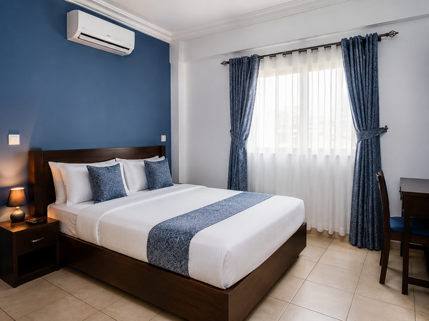 Chambre climatisée à La Résidence 244 Lomé